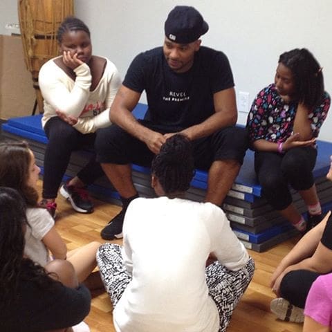 The founders of the Blossom Sisters Foundation with Anthony Burrell